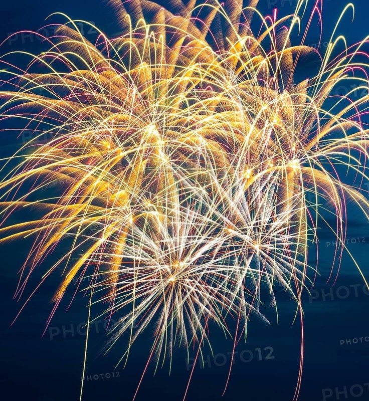 Brilliant fireworks with bright colours light up the night, atmospheric, magnificent, intense with many luminous colours, nocturnal, at night, blue night sky, Heligoland island festival in summer, symbolic image also for New Year's Eve, New Year's Eve fireworks, bright, colourful, many colourful traces of light, lively glitter, night, Heligoland island, Schleswig-Holstein, GermanyHeligoland island, North Sea, Schleswig-Holstein, Germany