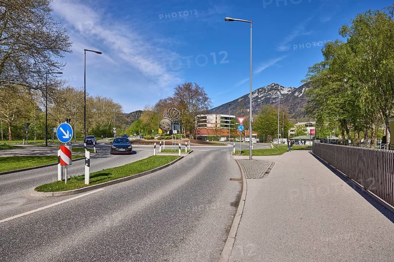 Road, traffic island, roundabout, lantern, metal railing, trees, lawn, mountain landscape, mountains, blue sky, cirrostratus clouds, federal road 20, Reichenbacher Straße, Bad Reichenhall, district Berchtesgadener Land, Bavaria, Germany