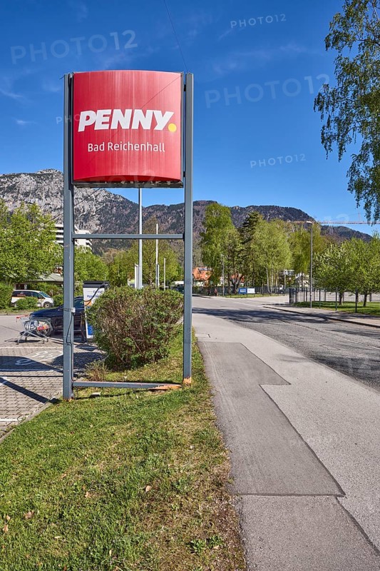 PENNY Markt GmbH, discounter, advertising sign, mountain landscape, mountains, trees, lawn, road, blue sky, cirrostratus clouds, Reichenbachstraße, Bad Reichenhall, district Berchtesgadener Land, Bavaria, Germany