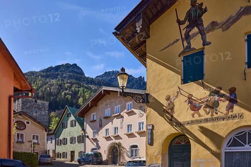 Historic buildings, square, aerial painting, food and dairy products, lantern, facade, window, mountain landscape, mountain, forest, blue sky, cirrostratus clouds, Florianiplatz, Bad Reichenhall, district Berchtesgadener Land, Bavaria, Germany