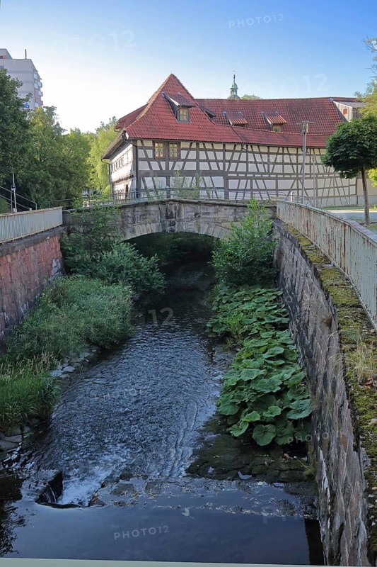 Armoury museum built in 1668, half-timbered house, back, bridge over the Lauter, stream, Suhl, Franconia, Thuringia, Germany