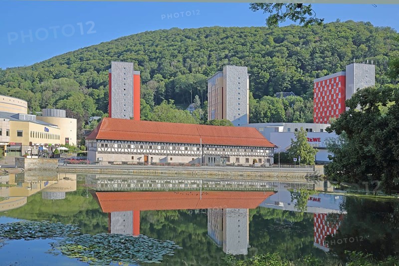 Arms museum built in 1668 with modern skyscrapers and reflection, half-timbered house, pond, congress centre, cityscape, mountain, forest, Thuringian Forest, Suhl, Franconia, Thuringia, Germany