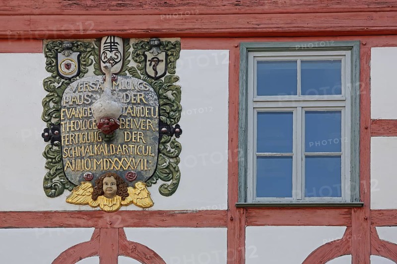 Monument with inscription : assembly house protestant, anno, roman, year, 1537, decorations, relief, church history, town history, detail, text, half-timbered, window, Lutherhaus, Schmalkalden