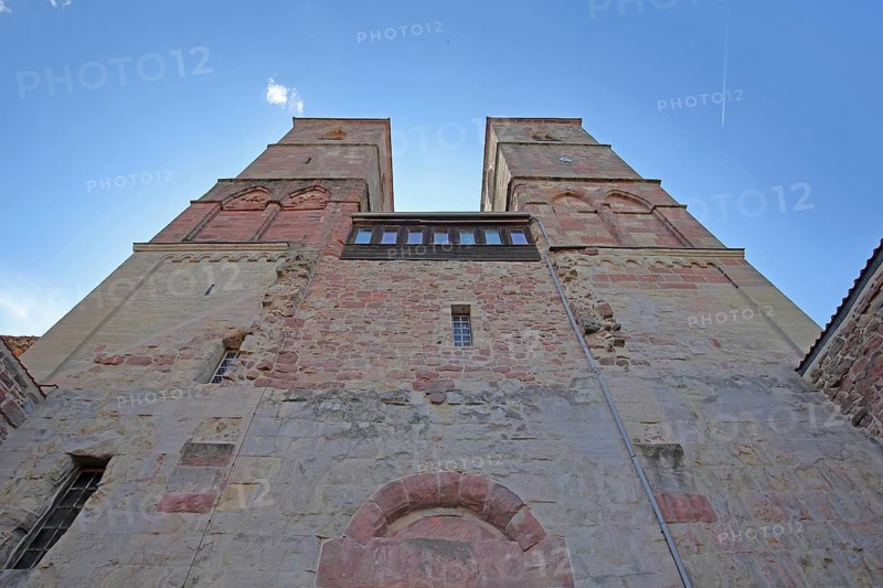 Romanesque St. Mary's Collegiate Church with twin towers, view upwards, perspective, church ruins, museum, Veßra Monastery, cobblestone, Thuringia, Germany