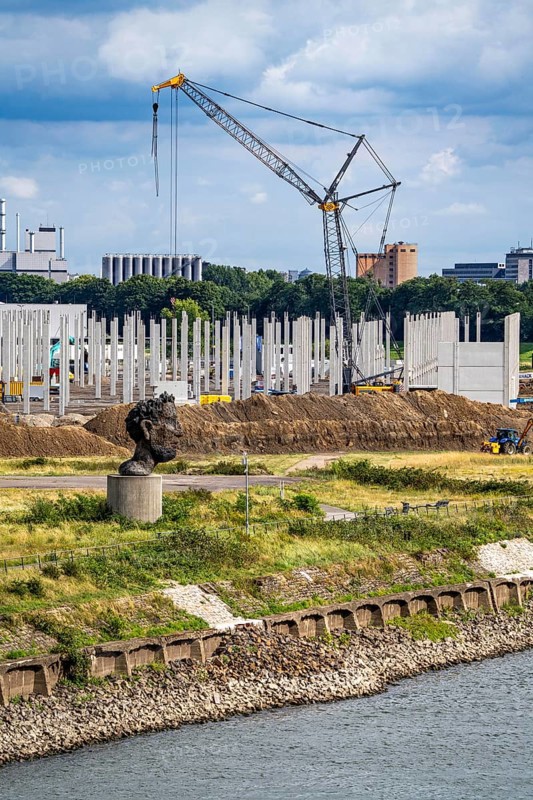 Construction of a new logistics hall on the Mercatroinsel, Hall 2, next to an existing hall, approx. 25, 000 square metres in size, in Duisburg-Ruhrort, shell construction, sculpture The Echo of Poseidon on the Rhine, North Rhine-Westphalia, Germany