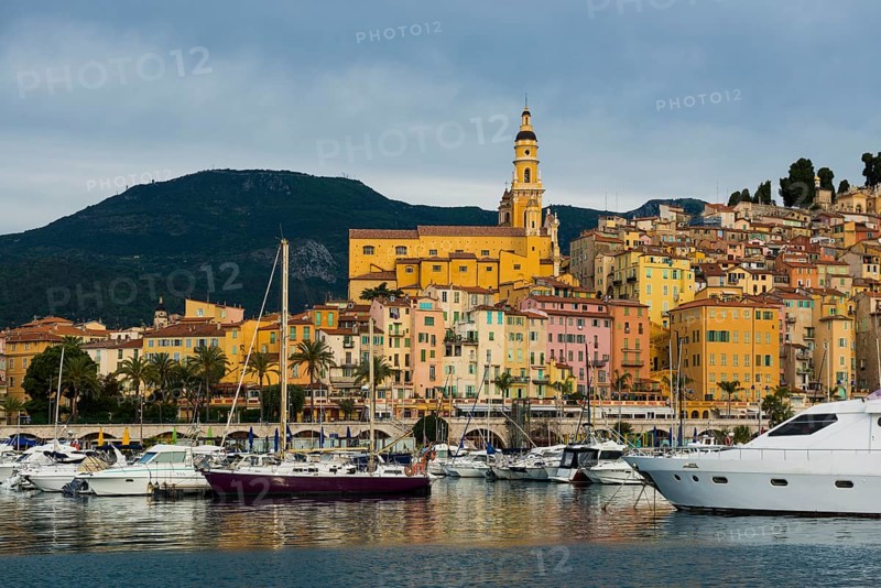 Town with colourful houses by the sea, sunrise, Menton, Alpes Maritimes, Provence Alpes Cote d'Azur, French Riviera, South of France, France