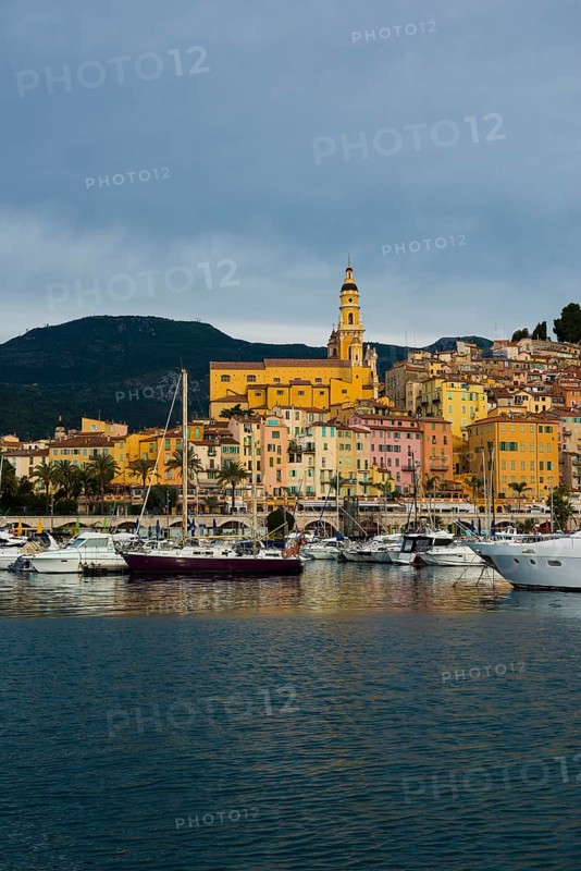 Town with colourful houses by the sea, sunrise, Menton, Alpes Maritimes, Provence Alpes Cote d'Azur, French Riviera, South of France, France