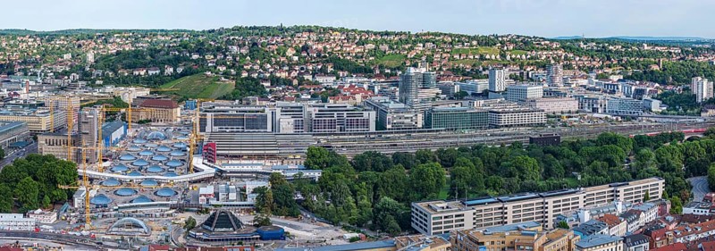 Stuttgart Central Station. Stuttgart 21 construction site, where the new through station is being built. On the top right is the Europaviertel with modern architecture, above it the Killesberg. Stuttgart, Baden-Württemberg, Germany