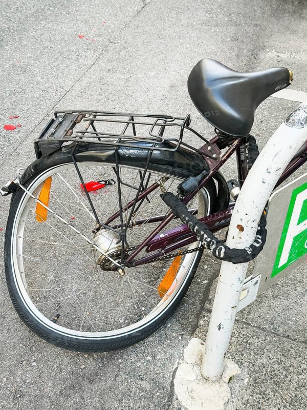 Deformed rear wheel of a bicycle in Vienna, Austria