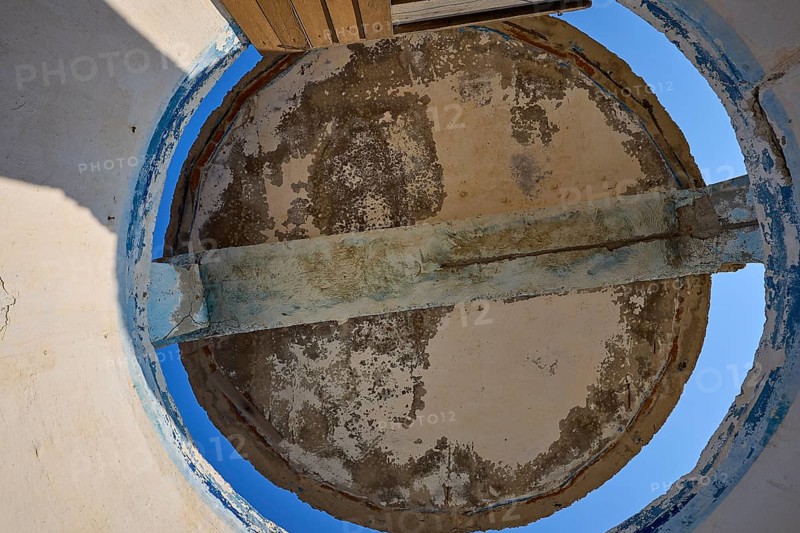 View from below of a dilapidated round roof structure with open sky, Lost Place, Lago anti-aircraft battery, bunker, Apitiki Mountain, Leros, Dodecanese, Greek Islands, Greece