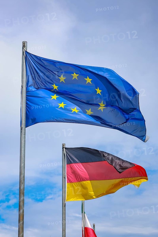 Düsseldorf, North Rhine-Westphalia, Germany - European flag, German flag and North Rhine-Westphalia flag fluttering in the wind on flagpoles, symbolic image of EUROPA