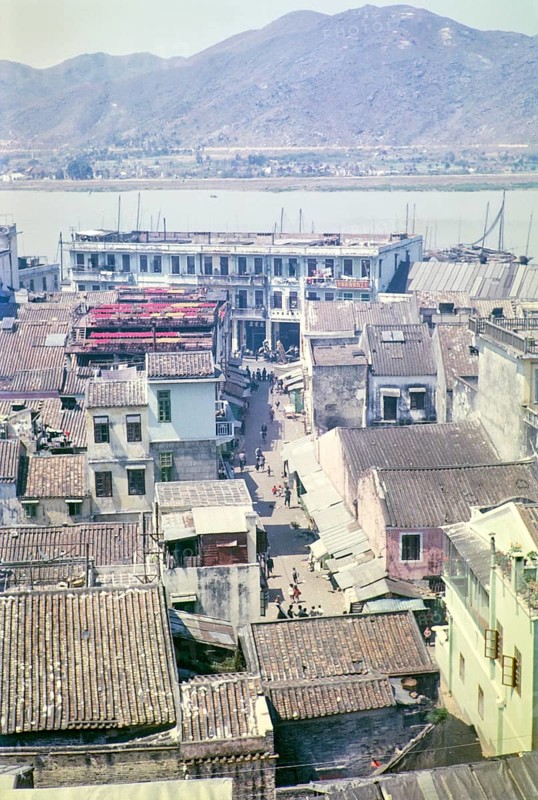 View over rooftops of traditional buildings in city centre from hilltop of Monte Fort, Macau, Asia 1964