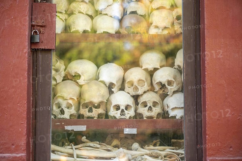 Shrine with human skull, memorial to the victims of the Khmer Rouge regime, Wat Thmei, Siem Reap, Cambodia