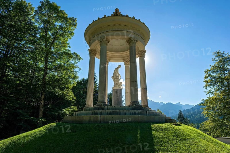 Statue of Venus with Cupid in the Temple of Venus above the terraced gardens, backlight, long shadows, blue sky, park of Linderhof Castle, UNESCO World Heritage Site, Ettal, Unterammergau, Garmisch-Partenkirchen, Upper Bavaria, Bavaria, Germany