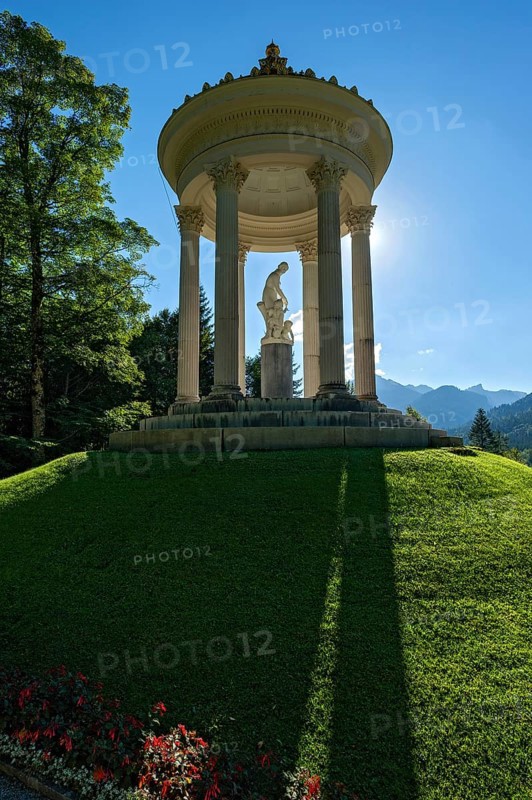 Statue of Venus with Cupid in the Temple of Venus above the terraced gardens, backlight, long shadows, blue sky, park of Linderhof Castle, UNESCO World Heritage Site, Ettal, Unterammergau, Garmisch-Partenkirchen, Upper Bavaria, Bavaria, Germany