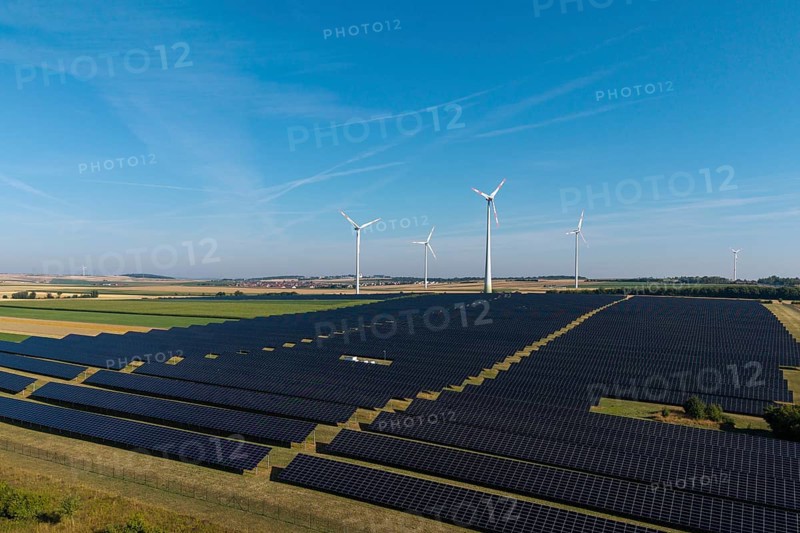 Extensive field with solar cells and wind turbines in rural area, near Kitzingen, Lower Franconia, Bavaria, Germany
