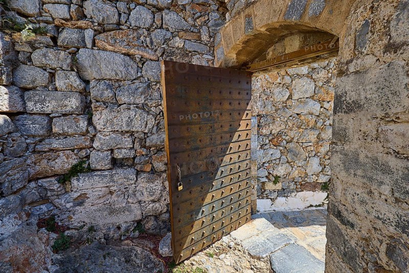 Rustic wooden gate in a stone-lined ruin, historical atmosphere, Pandeli Castle, castle, Leros Fortress, St John's Fortress, Apitiki Hill, Pandeli Bay, Agia Marina, Leros, Dodecanese, Greek Islands, Greece