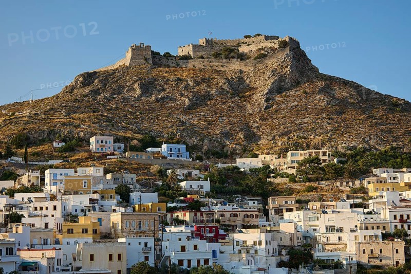 Hill with old castle above a town of white and pastel-coloured houses, Pandeli Castle, Castle, Leros Fortress, St John's Fortress, Apitiki Hill, Pandeli Bay, Agia Marina, Leros, Dodecanese, Greek Islands, Greece