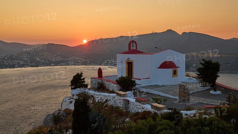 Chapel on a cliff at sunset with a view of the coast and mountains, Profitis Ilias Church, Prophet Elias Church, evening light, sunset, Ormos Alintas, Agia Marina, Leros, Dodecanese, Greek Islands, Greece