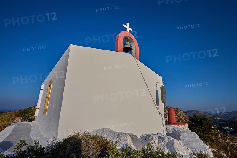 Simple chapel with bell on a hill, blue sky in the background, Profitis Ilias Church, Prophet Elias Church, evening light, sunset, Ormos Alintas, Agia Marina, Leros, Dodecanese, Greek Islands, Greece