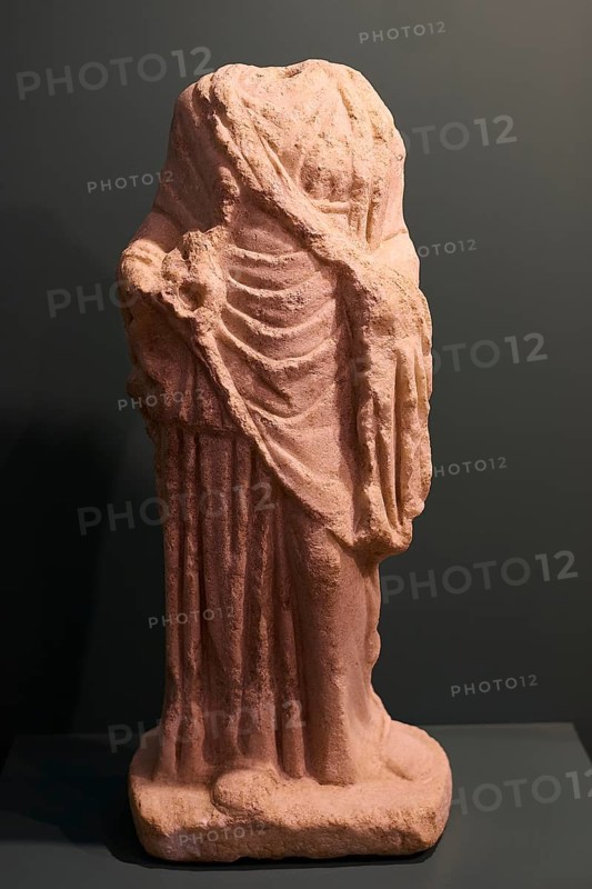 Headless ancient Roman statue fragment with draped robe made of sandstone, Archaeological Museum, Agia Marina, Leros, Dodecanese, Greek Islands, Greece