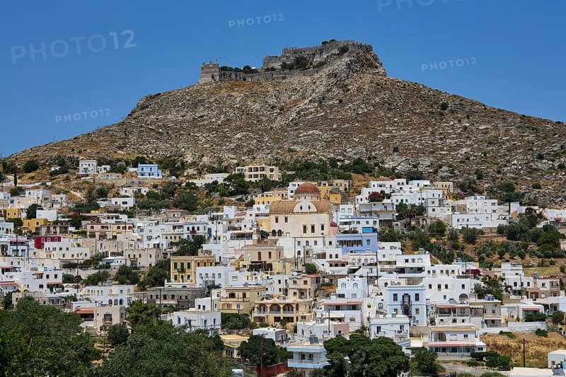 White village below a rocky castle on a hill, Pandeli Castle, castle, Leros Fortress, St John's Fortress, Apitiki Hill, Pandeli Bay, windmills, Leros, Dodecanese, Greek Islands, Greece