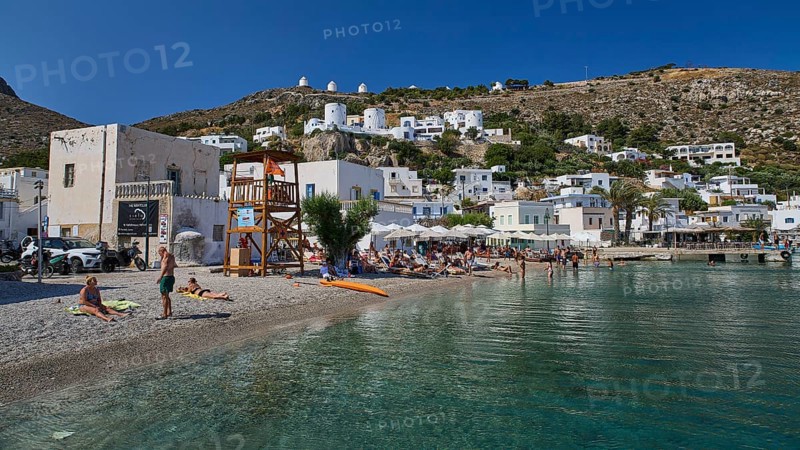 Coastal town with beaches and houses on the hillside under a clear sky, Pandeli Beach, Pandeli Castle, Castle, Leros Fortress, St John's Fortress, Apitiki Hill, Pandeli Bay, Windmills, Leros, Dodecanese, Greek Islands, Greece