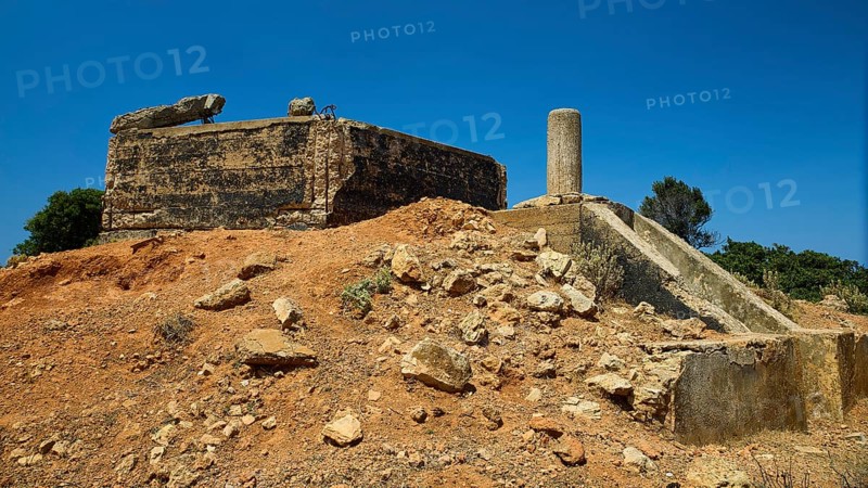 Old, crumbling structure on a desert-like terrain with rubble, Lost Place, Air Defence Position, Aerophone, Parabolic Acoustic Mirror, Patella Mountain, WW2, west of Lakki, Leros, Dodecanese, Greek Islands, Greece