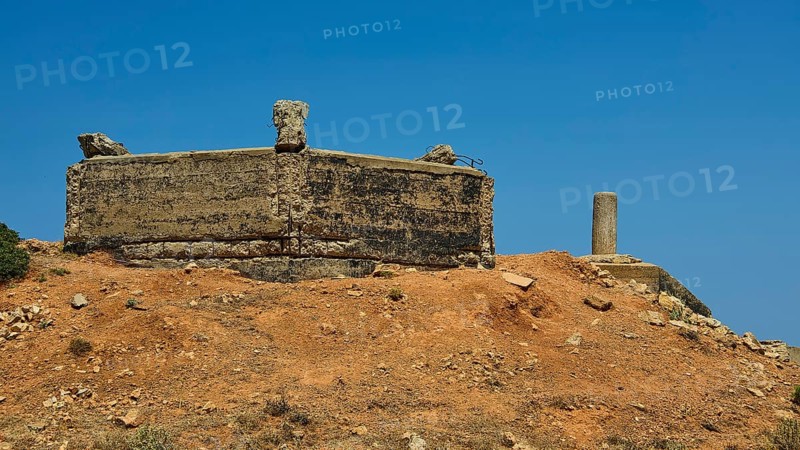 Abandoned concrete structure on a dry hill under a clear sky, Lost Place, Air Defence Position, Aerophone, Parabolic Acoustic Mirror, Patella Mountain, WW2, west of Lakki, Leros, Dodecanese, Greek Islands, Greece