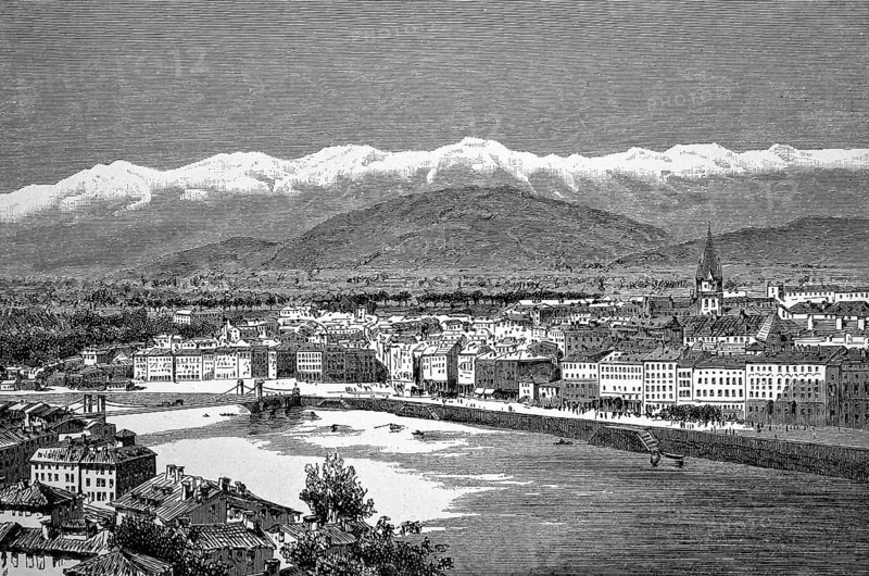 Cityscape of Grenoble on the river Drac, old town with church, snow-covered Alps mountain range, France, historical illustration 1896
