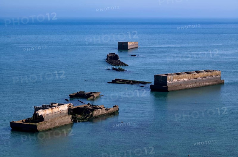Phoenix Caissons, concrete boxes, caissons, were used in the sea as breakwaters and to form an improvised harbour, Mulberry B Harbour, Mulberry Harbour, Port Winston, Gold Beach, beach, D-Day, Operation Overlord, Arromanches-les-Bains, Normandy, Calvados, France