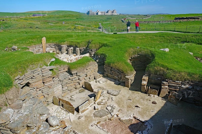 Wide view of an archaeological site with ruins in grassy landscape, Skara Brae, Neolithic settlement, Mainland, Orkney Islands, Scotland, Great Britain