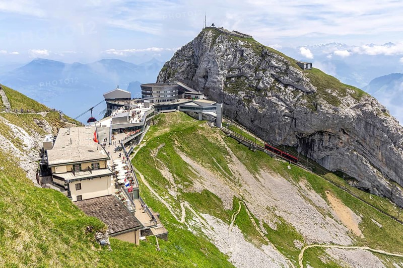 Mount Pilatus Mountain summit with cable car and cog railway in the Swiss Alps in Pilatus, Switzerland