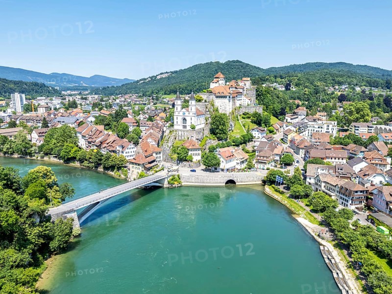Aarburg town on the river Aare with church and fortress Aerial view from above in Aarburg, Switzerland