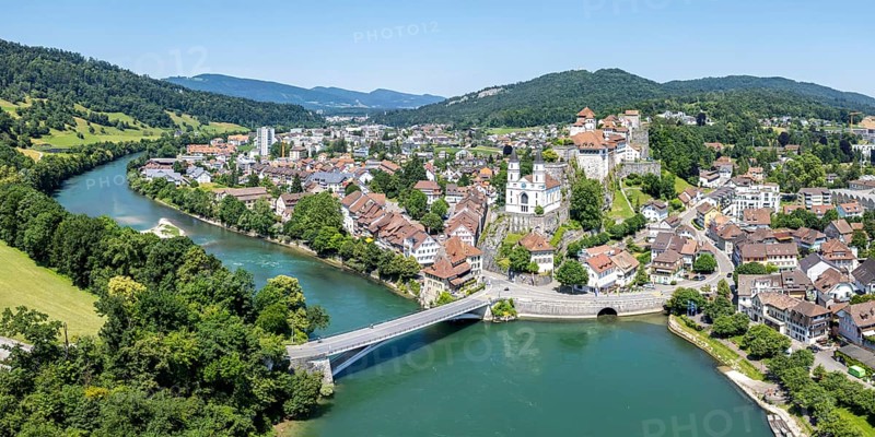 Aarburg town on the river Aare with church and fortress Aerial view panorama from above in Aarburg, Switzerland