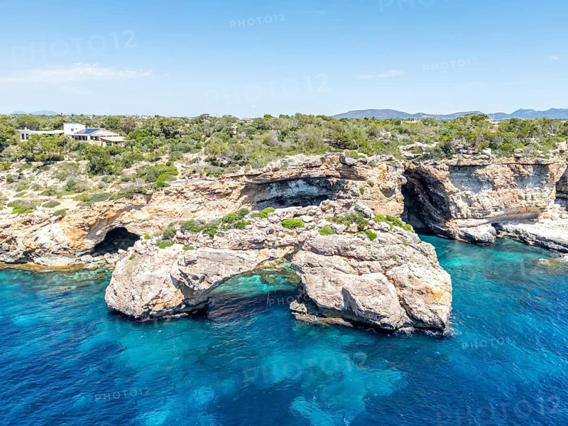 Es Pontas rock gate near Cala Santanyi on the island of Majorca in the Mediterranean Sea, travelling in Santanyi, Spain