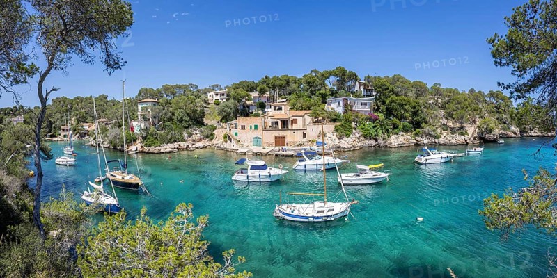 Bay of Cala Figuera on Majorca with boats panoramic holiday by the sea trip in Cala Figuera, Spain