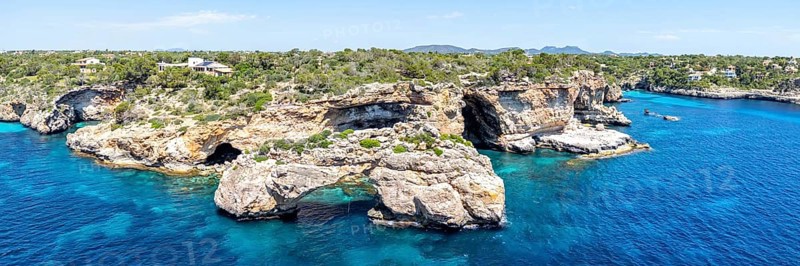 Es Pontas rock gate near Cala Santanyi on the island of Majorca in the Mediterranean Sea Travel Panorama in Santanyi, Spain