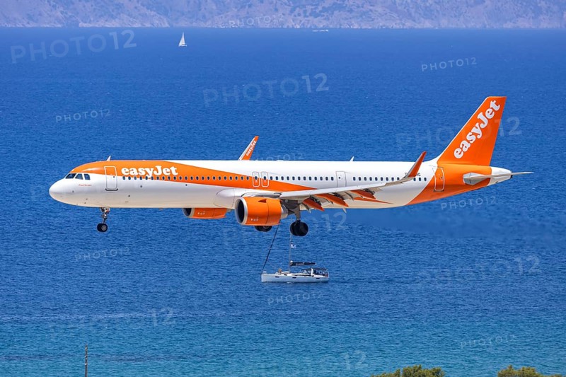 An EasyJet Airbus A321neo aircraft with the registration G-UZMG at Rhodes Airport, Greece