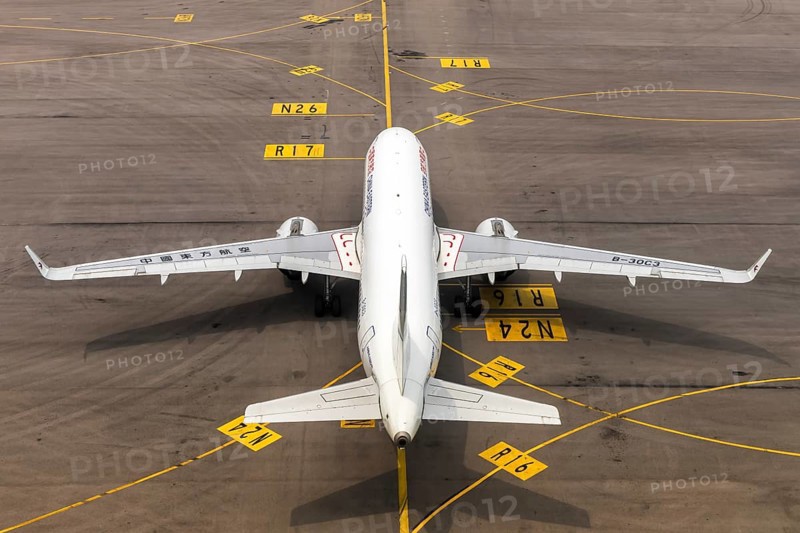 A China Eastern Airlines Airbus A320neo aircraft with the registration number B-30C3 at Chek Lap Kok Airport (HKG) in Hong Kong, China