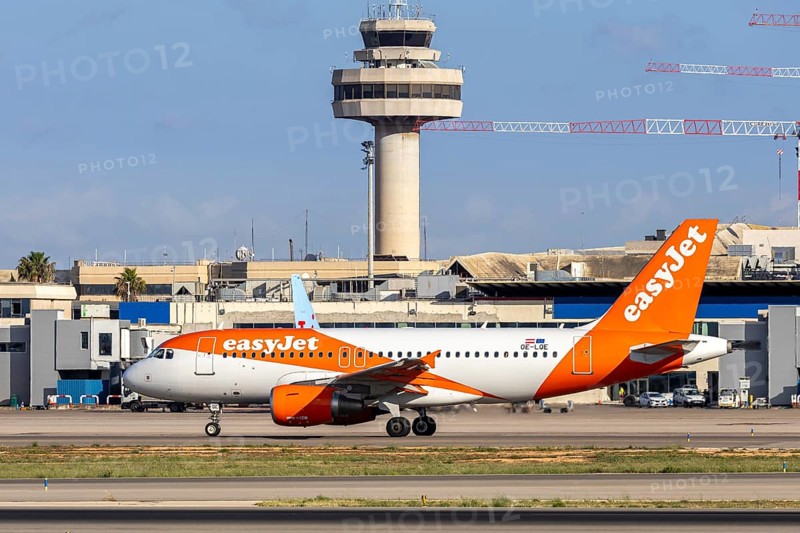 An EasyJet Europe Airbus A319 aircraft with the registration number OE-LQE at Palma de Majorca Airport, Spain