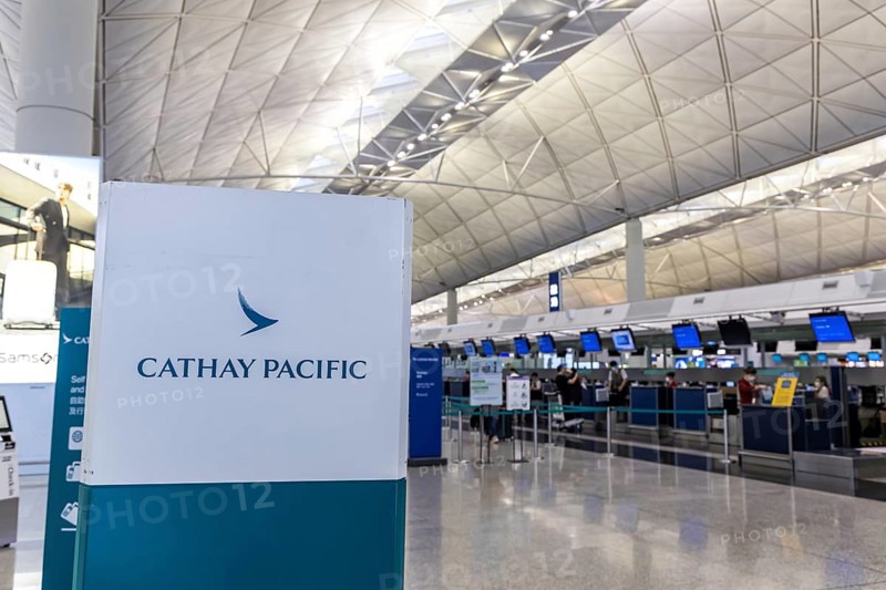 Cathay Pacific check-in counter in the terminal at Chek Lap Kok Airport (HKG) in Hong Kong, China