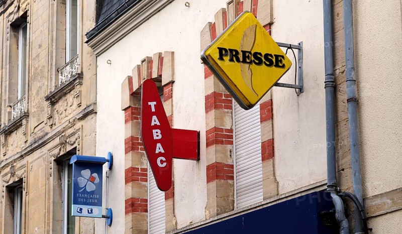 Typical sign of a shop for tobacco, press, magazines, gambling, old town, Bayeux, Normandy, Calvados, France