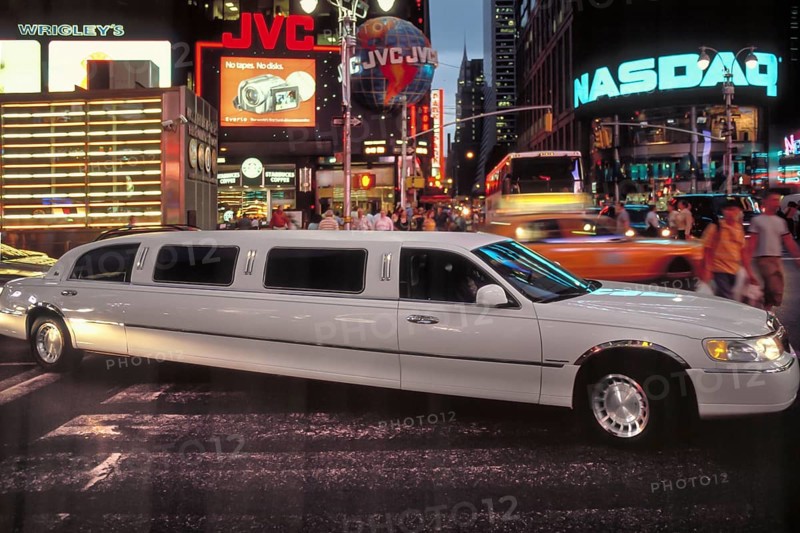 Stretch limousine at Time Square in the evening, New York, USA