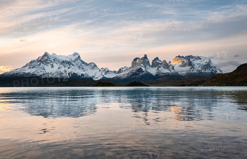 Cuernos del Paine mountain range at sunset, reflection in Lago Pehoe, Torres del Paine National Park, Chile