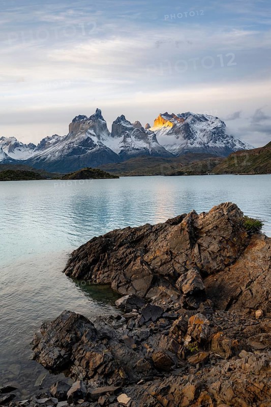 Cuernos del Paine mountain range at sunset, shore of Lago Pehoe, Torres del Paine National Park, Chile