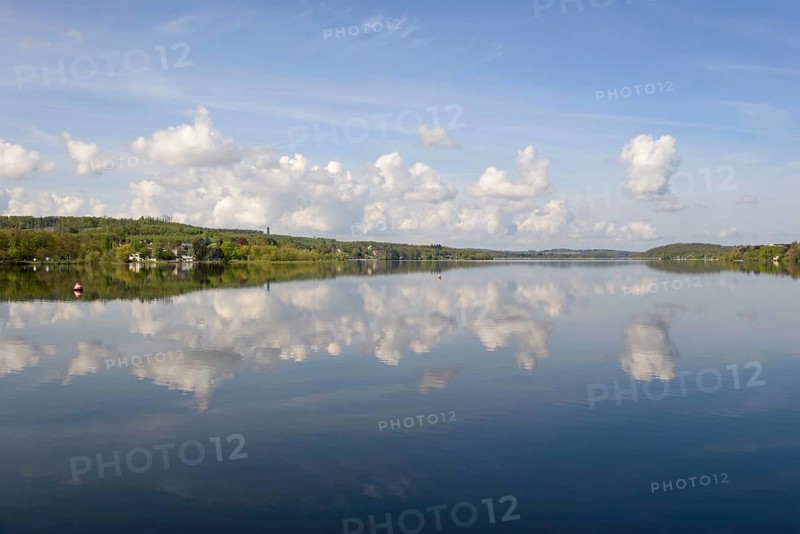 View over the Möhnesee, Möhnesee tower, red and white buoy, blue cloudy sky, reflection on the water surface, Möhnetalsperre, North Rhine-Westphalia, Germany