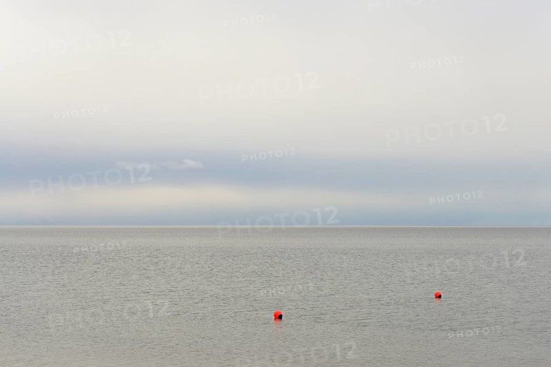 North Sea, red buoys in the Wadden Sea, Norddeich, Lower Saxony, Germany