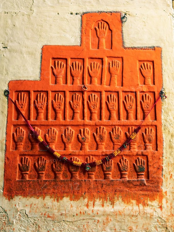 Sati stone hands mark the site of a woman's self-immolation at Mehrangarh or Meherangarh Fort, Jodhpur, Rajasthan, India