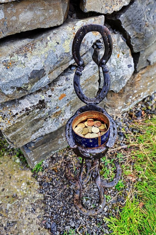 Tin with coins, donations for visiting a church, decorative stand, Vidimyrarkirkja peat church, Vidimyri, near Varmahlid, Skagafjörður, Iceland